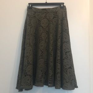 Green rocky steady skull skirt. Size Small.